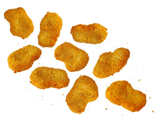 Falling fried chicken nuggets with crumbs isolated on white background with clipping path, full depth of field. Top view, flat lay.