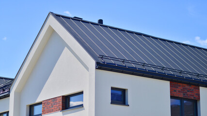 Terraced single family homes in newly developed housing estate. The real estate market in the suburbs. 