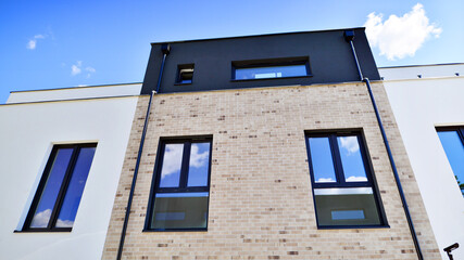 Terraced single family homes in newly developed housing estate. The real estate market in the...