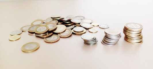 Stacks of Turkish money, broken metal Turkish Lira on a white background.
