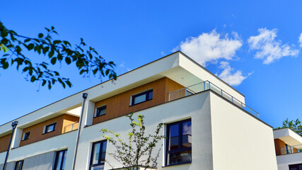 Terraced single family homes in newly developed housing estate. The real estate market in the...