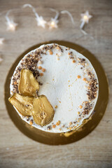 Spiced Pear Cake with vanilla cream, golden pear slices, star sprinkles, and burning sparklers