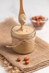 peanut butter, nut butter in a jar, peanuts, healthy eating