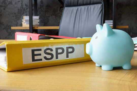 Piggy bank and folder with employee stock purchase plan ESPP.