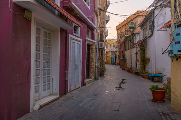 The narrow street in Sour (Sur), Lebanon, with designed colorful walls.
