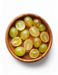 fresh grape slice in wooden bowl isolated on white background