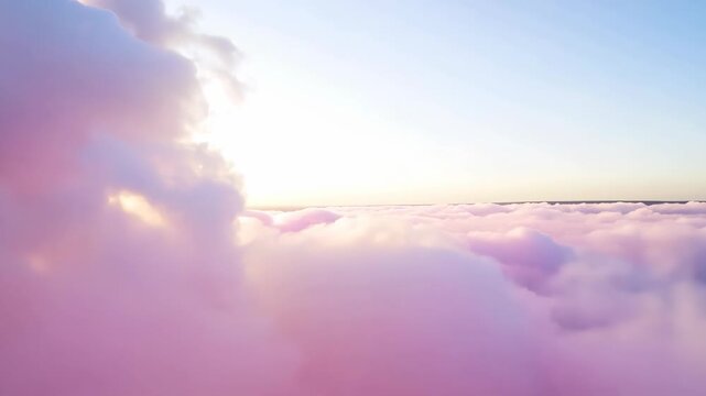 Flying through fluffy pink clouds in sky. Scenic aerial view. Tranquil sky and sugar cotton cloudscape concept. Dreamy and ethereal