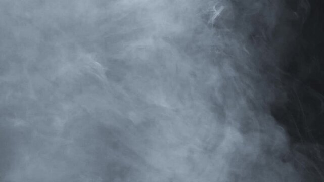 Abstract white smoke in slow motion. Smoke, Cloud of cold fog in light spot background. Light, white, fog, cloud, black background, 4k, ice smoke cloud. Floating fog. 3d SMOKE MODEL