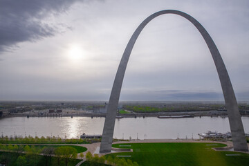 View of Mississippi River and Gateway arch on an overcast day in St. Louis