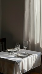 Minimalist dining scene with single place setting on white tablecloth in realistic photo