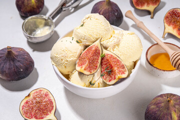 Tasty fig gelato ice cream, aromatic and creamy fruit sorbet dessert with autumn spicy flavour, in...