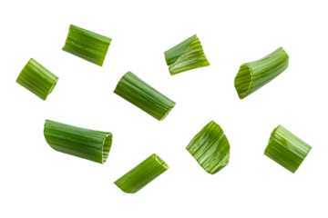 Falling green onion slices, cut chives isolated on transparent or white background