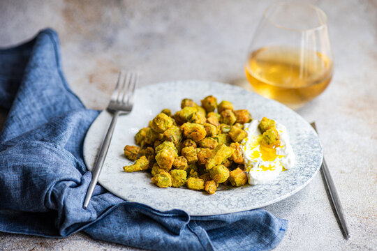 Fried bamia with sour cream sauce, Mediterranean dish