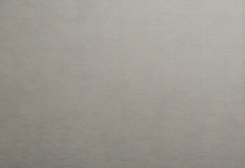 A textured gray background with subtle wave patterns, creating a modern and elegant appearance. Ideal for use in design and decor.