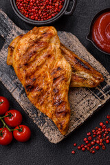 Delicious fresh grilled chicken fillet with spices and herbs