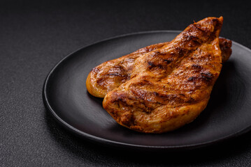 Delicious fresh grilled chicken fillet with spices and herbs