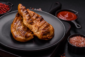 Delicious fresh grilled chicken fillet with spices and herbs