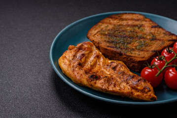 Delicious fresh grilled chicken fillet with spices and herbs