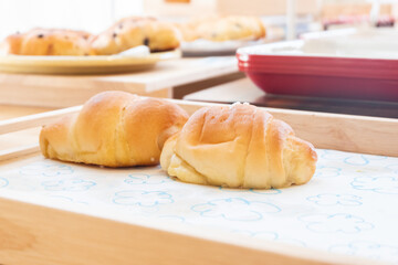 Fresh Baked Shio Pan or Japanese sea salt butter bread rolls in bakery shop,Homemade pastry with sesame,japan or korea bakery shop,copy space.