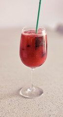 alcoholic aperitif with watermelon mojito, based on rum, lime and mint, in the warm summer evenings of the Ligurian Riviera, in the summer of 2024