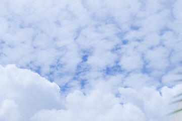 Altocumulus clouds on blue sky background with modern Home with Elements of architecture of buildings,sunny and Large Sheep Clouds,copy space.