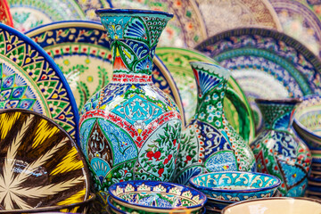 Multicolored ceramic dishes with oriental ornaments at the Siab Bazaar.