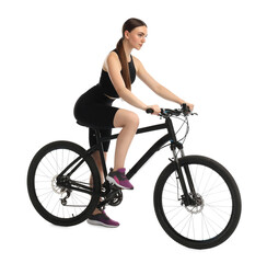 Naklejka premium Beautiful young woman riding bicycle on white background