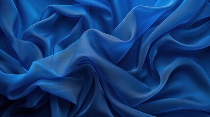 Obraz premium Canvas or muslin fabric cloth backdrop suitable for portraits products or concepts, with dramatic blue modulations.