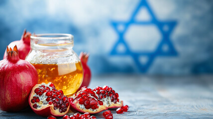 Rosh hashanah, jewish new year holiday, background with pomegranate and honey, traditional food for celebration 