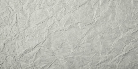 Softly textured gray paper background with subtle fibers and gentle creases, evoking a sense of simplicity and sophistication, ideal for creative projects and designs.