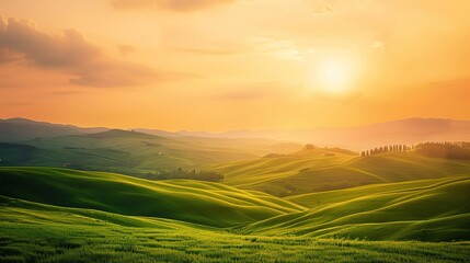 Obraz premium Vibrant Sunset Over Rolling Green Hills in a Serene Landscape