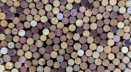 Background and texture. Numerous winNumerous wine corks close-up randomly arrangede corks close-up