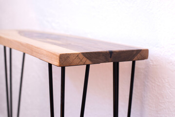 Wooden coffee table console. Table in loft style. A table made of a section of a walnut tree trunk...