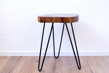Wooden coffee table. Table in loft style. A table made of a section of a walnut tree trunk. Epoxy...