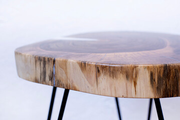 Wooden coffee table. Table in loft style. A table made of a section of a walnut tree trunk. Epoxy...