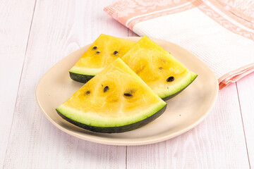 Sweet and juicy yellow watermelon slices