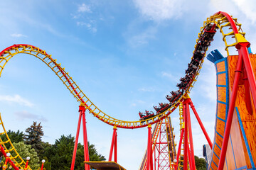 A roller coaster in action at an amusement park