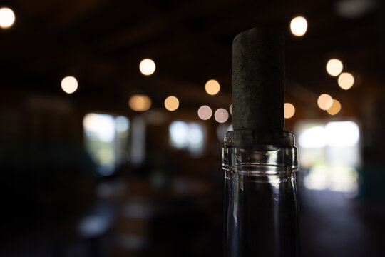 Cork in a winery bottle with bokeh