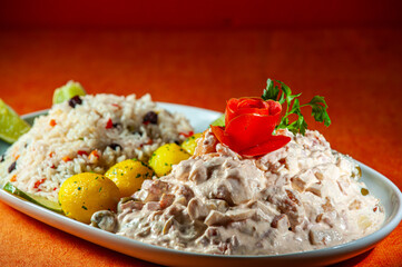 Seafood with pasta sauce, Greek rice and potatoes.