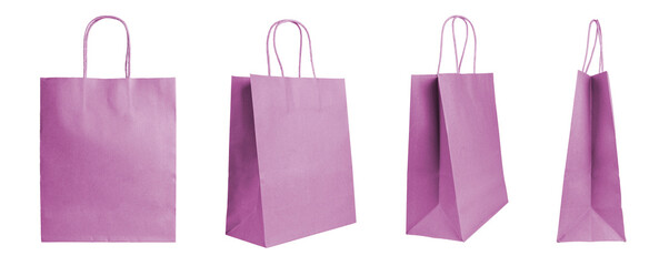 Set of different angles blank pink craft paper bags isolated on white, transparent background. Eco friendly shopping bag made from recycled paper, recycling concept. Mockup, template, copy space