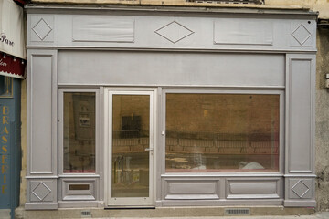 template for small storefront , parisian style boutique facade