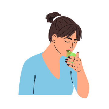 Woman breathes on her hand to check for bad breath. The stinking smell of unbrushed teeth in the form of a green cloud of smoke