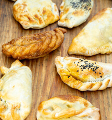 meat, fish, onion empanadas in many varieties, spicy, sweet
