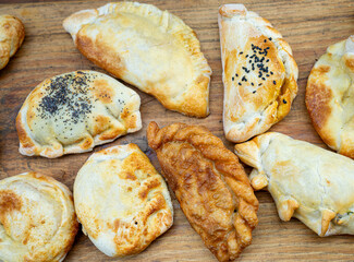 meat, fish, onion empanadas in many varieties, spicy, sweet
