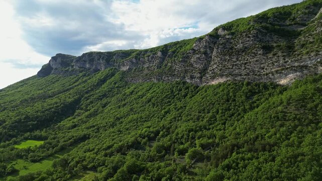 Panoramic mountain view near the village of Saou in the Drome department in France of the Vercors hills, the marly hills and the Val de Drome valley. The Saou forest and the 3 peaks - Drome Valley