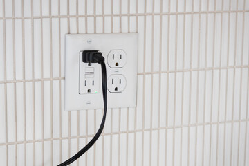 Appliance plugged in to GFCI outlet. Power cord plugged in