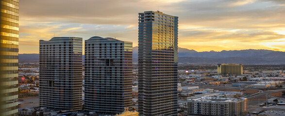 Buildings and skyline at dusk in Las Vegas with bright colorful sunset