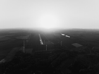 wind turbines in the fog