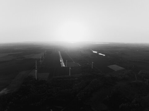 wind turbines in the fog
