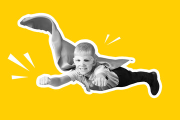 Happy schoolboy dressed as superhero flying on yellow background